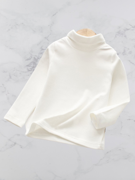 The “Natalie” White Turtleneck